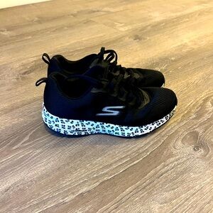 Skechers Black Sneakers with Leopard Speckled Sole